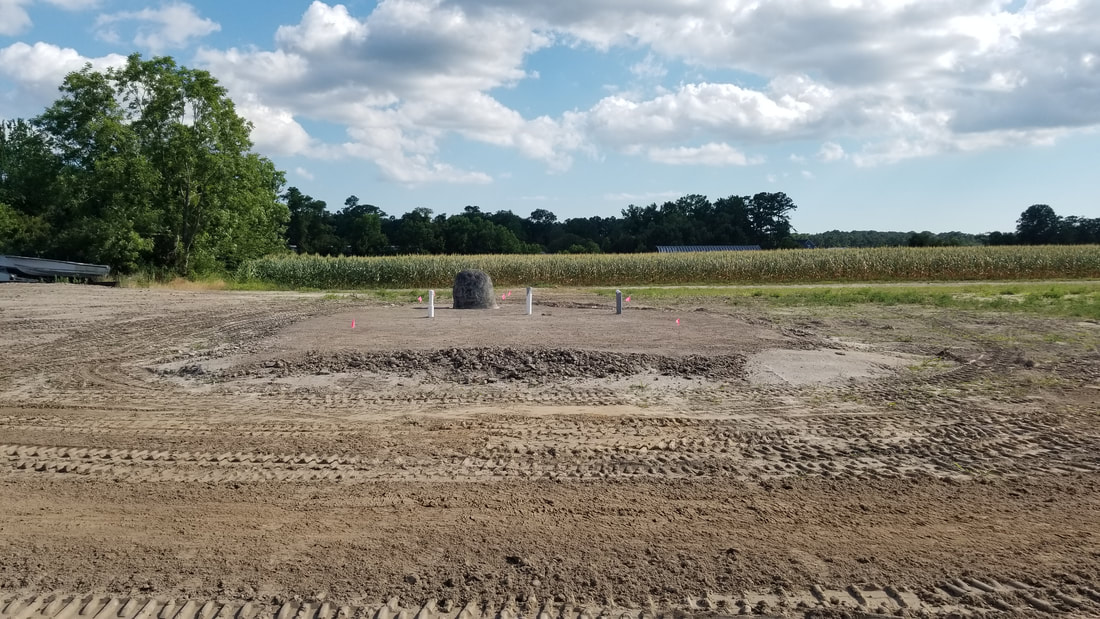 Picture of building pad for well house.