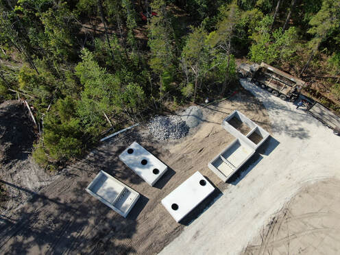 aerial Picture of a few septic tanks.