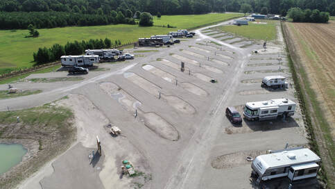 Picture of our pull thru sites. We are still working on growing grass.